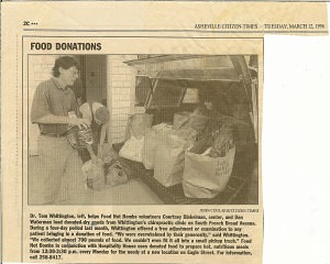 Dr Whittington loading food at the first Whittington Chiropractic food drive. 