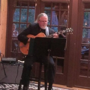image of Rick Praytor playing music at whittington chiropractic